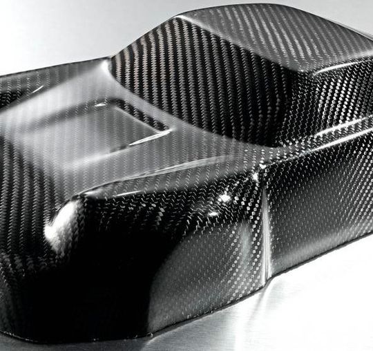 Carbonfasermodell eines Sportwagens, hergestellt mit Raku-Tool Flüssigsystemen von Rampf. Wie das hergestellt wurde, erfahren die Besucher des Rampf-Standes auf der JEC World 2016 in Paris vom 8. bis 10. März. Carbonfasermodell eines Sportwagens, hergestellt mit Raku-Tool Flüssigsystemen von Rampf. Wie das hergestellt wurde, erfahren die Besucher des Rampf-Standes auf der JEC World 2016 in Paris vom 8. bis 10. März.