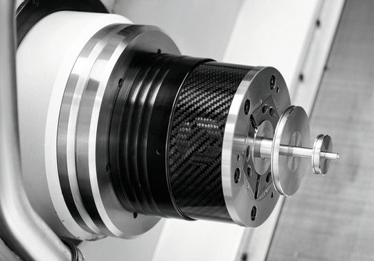 The company's carbon fiber reinforced plastic (CFRP) workholding in action. The company's carbon fiber reinforced plastic (CFRP) workholding in action.