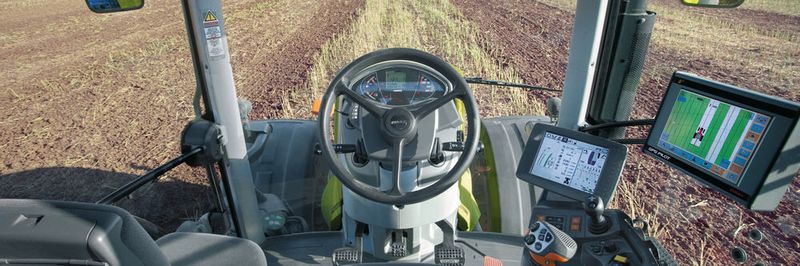 Moderne Landwirtschaft: Die Fahrerkabinen sind heutzutage mit zahlreichen unterstützenden Systemen ausgestattet wie Displays, Joysticks und GPS-Verbindung.
