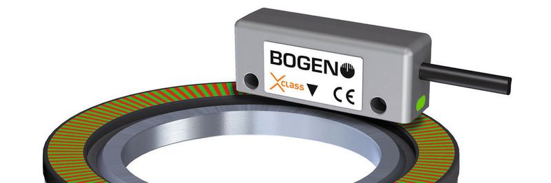 Bogen hat mit dem Tumapos-Sensor und den 80-µm-Maßstäben eine neue Messlösung aufgebaut. Die Kombination von Maßstab und Messkopf erreicht Systemgenauigkeiten bis 5 µm, d. h. die Systemgenauigkeit ist mit optischen Messlösungen vergleichbar.