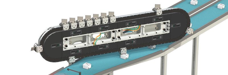 Das senkrecht montierte Hochgeschwindigkeits-1-Track-System ist hier im Einsatz um willkürlich positionierte Artikel in zwei getrennte Spuren zu befördern.