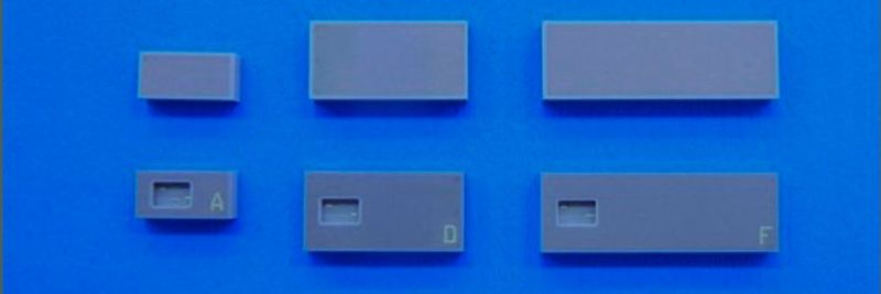 Keramische Bauteile mit integrierter RFID-Antenne (Skala mit 1,0 mm Schritten). Die auf IoT abzielende Entwicklung von Kyocera ermöglicht neue RFID-Applikationen für den Automotive- und mHealth-Markt.