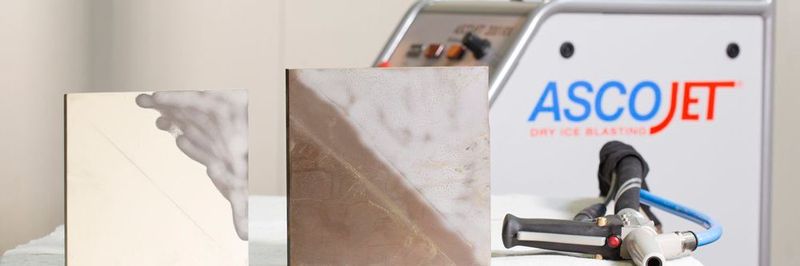 The left casting shows the yellowish coating which was partially removed with combination blasting (metallic silvery area). One half each of the right casting was cleaned with pure dry ice blasting (dark area) or combination blasting (bright area).