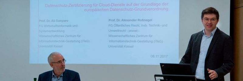Eindruck von der Auftaktveranstaltung mit Prof. Dr. Ali Sunyaev (re.) und Prof. Dr. Alexander Roßnagel.
