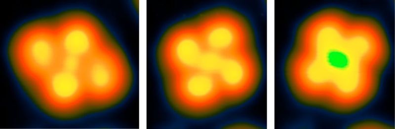 Die Aufnahmen aus dem Rastertunnelmikroskop (RTM) zeigen die drei verschiedenen Zustände des Moleküls, die einem trinären Code zur Informationsverschlüsselung entsprechen: Im hohen magnetischen Zustand (links), im niedrigen magnetischen Zustand mit näher zusammengerückten Atomen (Mitte) und mit ebenfalls niedrigem magnetischen Zustand, aber um 45 Grad gedreht (rechts).