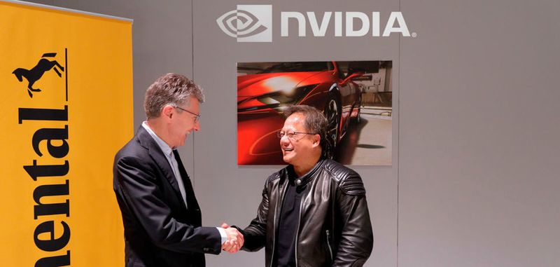 Continental CEO Dr. Elmar Degenhart (links) und NVIDIA Gründer und CEO Jensen Huang (rechts) einigen sich auf gemeinsame Entwicklung Künstlicher Intelligenz für selbstfahrende Fahrzeuge.