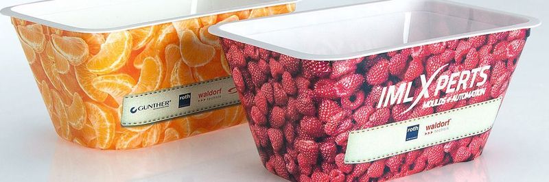 In-mould labelling enables high packaging quality. The plastic label is placed in the injection mould before injection.