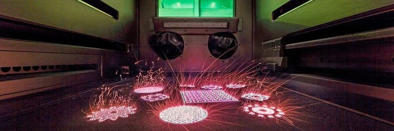 Markus Merkel can monitor the printing process through a glass panel. In the 3D printer, laser light melts a metallic powder. Thus, layer by layer, complex products can be made of metal.