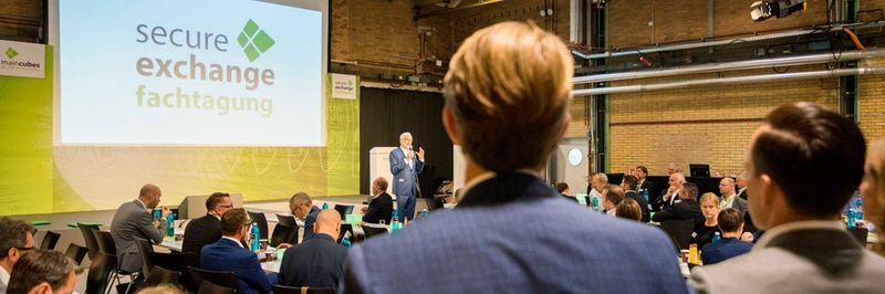 Eröffnung der Secureexchange Fachtagung durch Dr. Jens J. Gerber, Mitglied der Geschäftsleitung von maincubes.