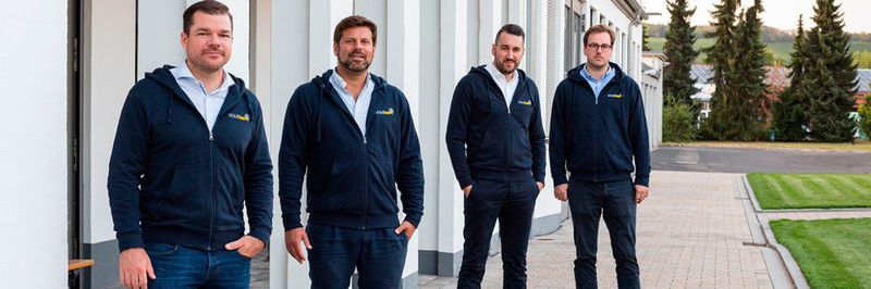 Die scoutbee-Führungscrew): Gregor Stühler, Prof. Dr. Christian Heinrich, Fabian Heinrich und Lee Galbraith.