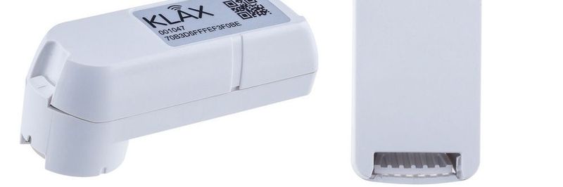 KLAX ist ein Aufsatz für die im Smart Meter integrierte optische Schnittstelle, der einfach per Magnet angeheftet wird. So können die Werte über die Impulse aufgenommen und bei Bedarf für Zusatzdienste verwendet werden.