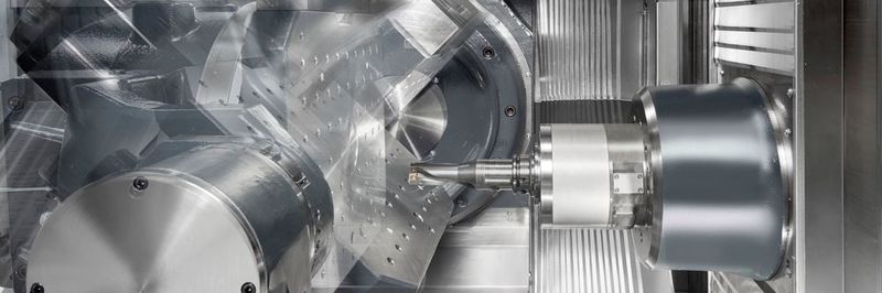 Produktivität in 5 Achsen: die HF 3500 von Heller mit NC-Rundschwenktisch mit Gegenlager für höchste Stabilität und Dynamik.