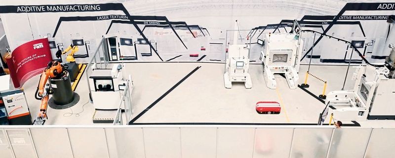 So sieht die erste vollautomatisierte Fertigung von metallischen AM-Teilen aus.