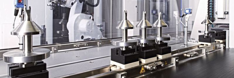 IMSTec manufactures automated production lines such as this one, which features a individually adapted robot grippers for the safe transport of medical components and products.