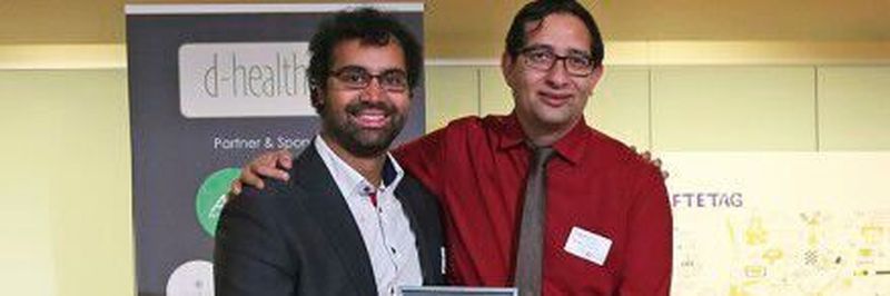 Dr. Dave Sircar und Robin Huq (v.l.), Gründer von Rollando, freuen sich über die Auszeichnung im Rahmen des D-Health Up Wettbewerbs.