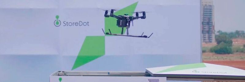 A drone using StoreDot’s UFC FlashBattery is shown lifting off from a StoreDot UFC station.