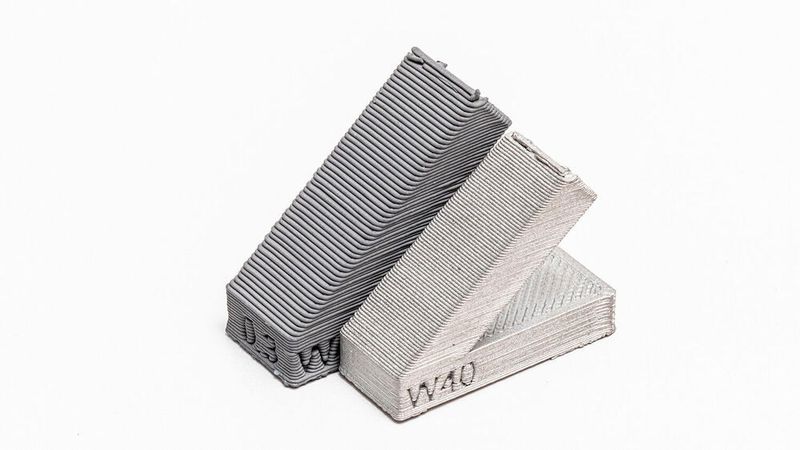 Stainless steel qualification samples produced with fused layer modeling (FLM).