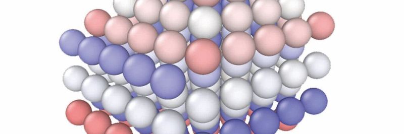 Schematische Darstellung der Dendritenbildung in einer Batterie: Die negative Ladung konzentriert sich auf den Spitzen von Vorsprüngen und zieht positiv geladene Lithium-Ionen an. Dadurch wachsen Dendriten heran