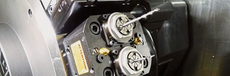 Mikro- und Tieflochbohrer der Serie ADO von OSG positionieren auch beim labilen Einspannen mit Spannzangen auf dem Revolver einer Langdrehmaschine hochgenau.