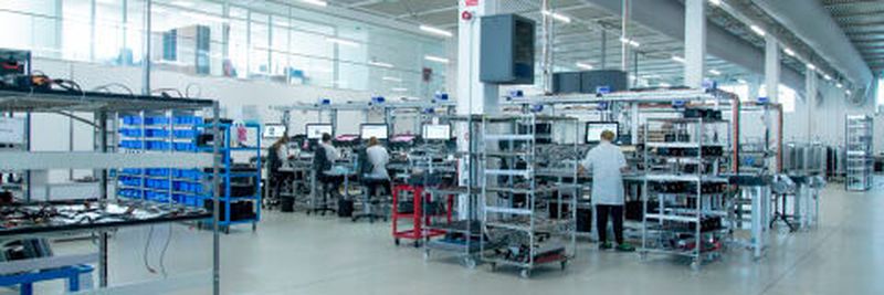 At EXOR’s smart factory in Verona, Italy, factory workers use Internet of Things and artificial intelligence-enabled industrial machines.