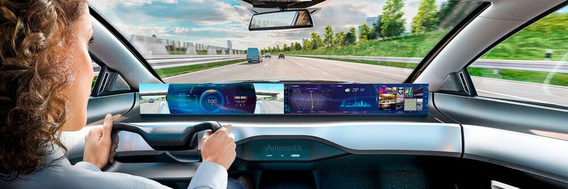 Software fährt mit: In modernen Autos haben längst Computerprogramme viele Funktionen übernommen. Dieses futuristische Conti-Cockpit zeigt dem Fahrer Informationen an, während der Beifahrer beispielsweise ein Filmprogramm genießen kann.