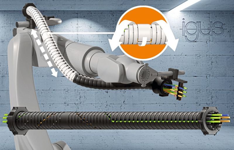 Das neue TRX-System von igus spart Platz an der dritten Roboterachse und sorgt für eine Rückzugslänge von bis zu 40 %.