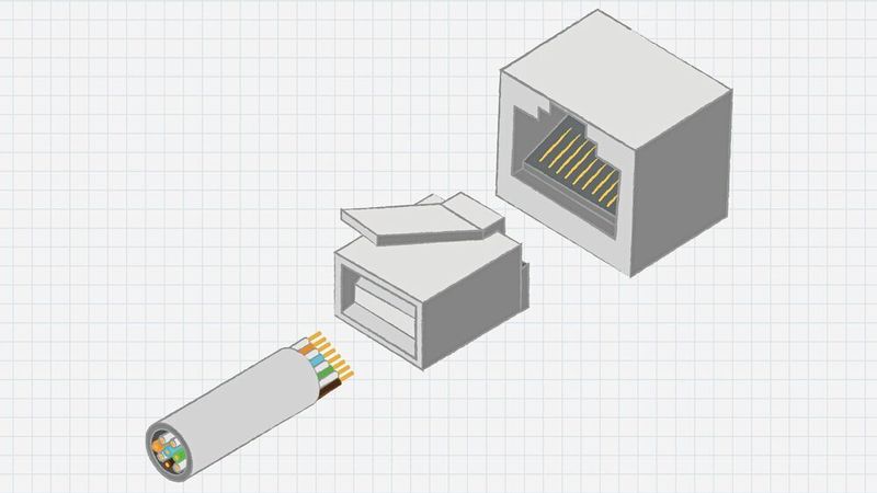 Bild 1: Ein modularer Stecker mit einem Kunststoffgehäuse fixiert ein Kabel und passt zu einer RJ-Buchse.
