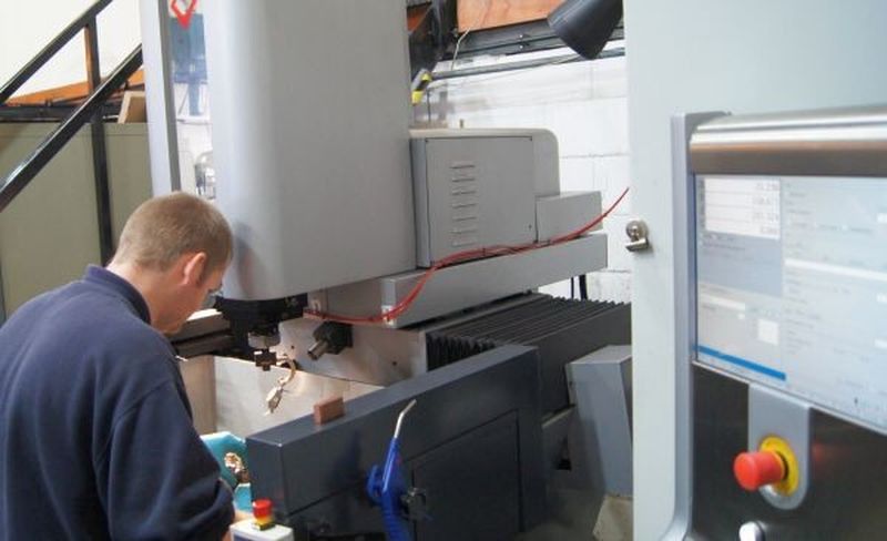An operator at C&M Mould Tools sets ultra-precision moulds for contact lens manufacture on the new ONA NX3 die-sinking EDM machine.