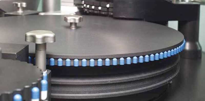 G250 capsule lid transfer wheel