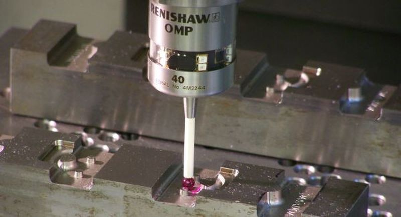 The spindle-mounted probe is important to re-setting the job when parts are re-positioned.