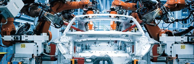 Im Zeitalter von IoT regeln die Referenzarchitektur RAMI und die Industrie-4.0-Komponente die industrielle Kommunikation. Im Bild der Karosseriebau des Audi TT.