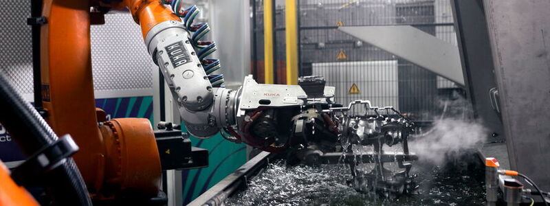 Robots Manufacture Products For Electric Mobility