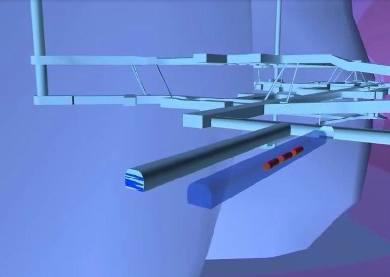 Ausschnitt aus der Simulation eines Endlagerbergwerks. Im Vordergrund wurden drei virtuelle Abfallbehälter (rot) in eine Strecke eingebracht, um die Ausbreitung der von ihnen ausgehenden Wärme zu simulieren. (Bild: GRS)