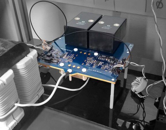 PCB-integrated bus bar and gate driver for 10 kV SiC MOSFET half-bridge module, with high-speed short circuit and overload protection. (Dr. Christina DiMarino)