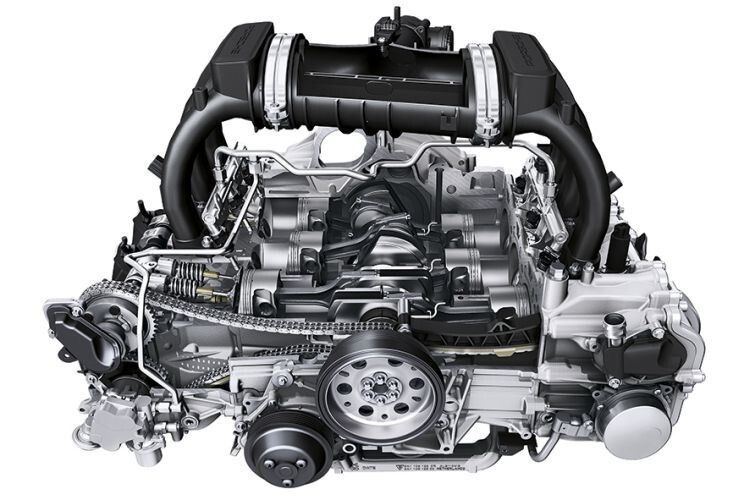 Der 2,7 Liter Sechzylinder-Boxer produziert in der Standardausführung 265 PS/195 kW sowie ein Drehmoment von 280 Nm zwischen 4.500 und 6.500 min-1. Als Mittelmotor verpflanzt, sorgt er – anders als im 911 – für eine perfekte Gewichtsbalance des Fahrzeugs. (Foto:Porsche)