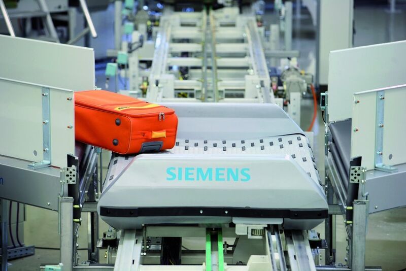 Der neue Crossbelt-Tray von Siemens kombiniert die Vorteile von Behälter und Quergurt: Das Ein- und Ausschleusen der Gepäckstücke erfolgt ohne Gefälle.Bild: Siemens (Archiv: Vogel Business Media)