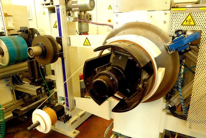 Herz einer jeden Haspel ist die Coilaufnahme, die für eine entscheidende Funktion und Qualität der Bandwicklung steht und sich geregelt den Parametern Banddicke, Bandbreite, Coil mit oder ohne Innenkern kontinuierlich anpasst. (Kuhn)