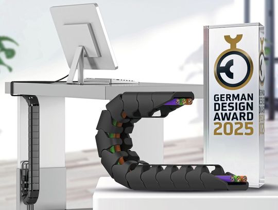 Die mit dem German Design Award ausgezeichnete Office Chain OCO von igus ermöglicht eine geordnete und sichere Leitungsführung. (Bild:  igus)