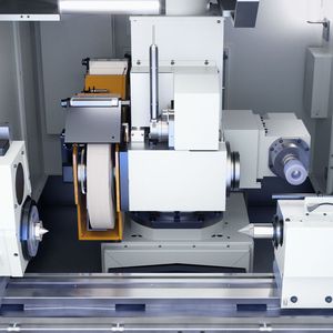 Work area of the Emag UG Series. The combination of swiveling B-axis and direct-drive spindles enables internal and external grinding.(Source:  Emag)