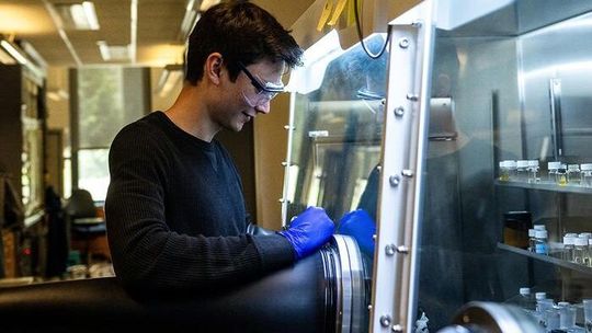 Graduate student Alexander Arnette working in the lab of Jonathan Kuo, assistant professor of chemistry in the Penn State Eberly College of Science.(Source:  Jaydyn Isiminger/ Penn State)