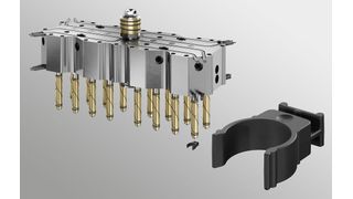 A 1.2-gram cable clipper produced using Oerlikon HRS Flow's Sa Series with a 16-drop open gate system. Specifically designed for processing PA66 with 30 percent glass fiber (GF), this solution ensures flawless part filling and exceptional process repeatability. (Source: Oerlikon HRS Flow)