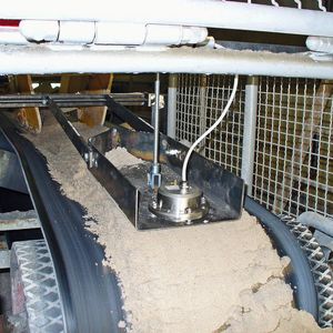 Feuchtemessung von Sand auf dem Förderband.(Bild:  Mütec)