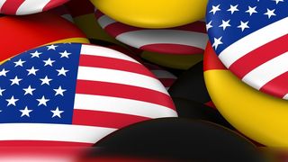 Die Nationalsymbole bunt gemischt; so war es bislang: USA und Deutschland nicht nur politisch, sondern auch wirtschaftlich eng miteinander verbunden. Mit der Präsidentschaft von Donald Trump verbinden sich Ängste, ob das so bleibt. (© Fredex - Fotolia.com)