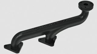 Dans le processus DLS de Carbon 3D, la résine polymère liquide est durcie avec précision et simultanément sur toute la zone de construction en projetant une lumière UV à travers une fenêtre perméable à l'oxygène. (Image : Protolabs)