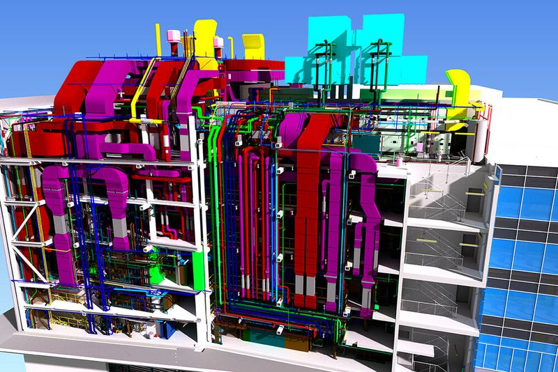 Abbildung 4: Vertikale Steigleitungen zur Medienerschließung (Luft, Prozess-, Rein-, Schwarzmedien) an der Westseite des Gebäudes. Die Außenwand ist aus Blech mit Sandwichpaneelen, das Design erlaubt den Anschluss eines neuen Gebäudes, sollte dies in der Zukunft erwünscht sein. (Bild: ZETA GmbH)