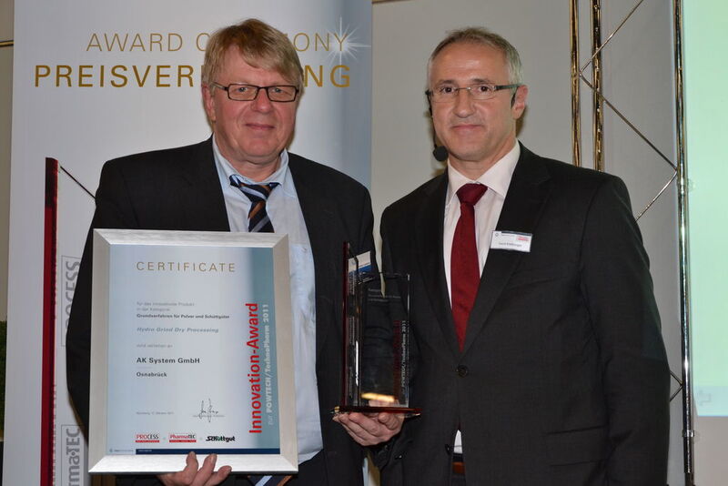 The Hydro Grind process by AK System was previously applied mainly in the wet area for producing semi-solid as well as pasty products. Heribert Leimbrink, AK System, (left) received the award in the category Basic Processing Technologies for Powder and Bulk Material.  (Picture: PROCESS)