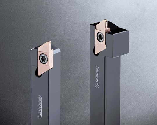 Horn’s expanded S274 tool system includes sintered chip-breaker geometries primarily aimed at turning, grooving and parting off on sliding-head lathes.(Source:  Horn)