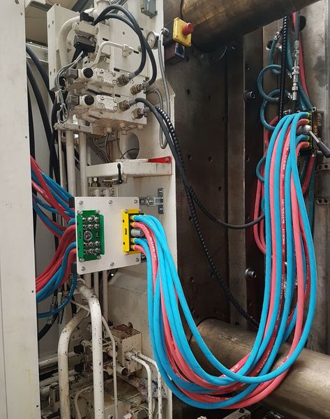 Coloured multi-couplings as a bulkhead plate solution with completely removable hose packages  (Source: Nonnemann)