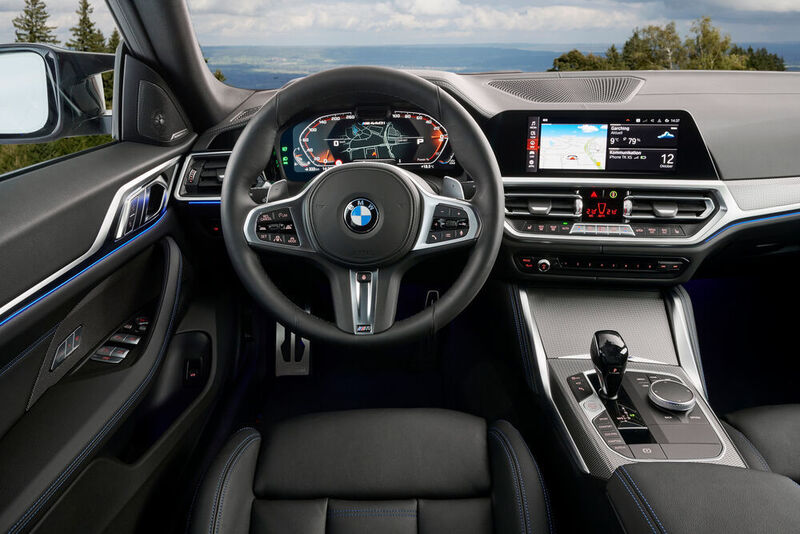 Fahrer und Passagiere sitzen tief. Die Armaturentafel ist BMW-typisch mit deutlicher Fahrerorientierung gestaltet. (Tom Kirkpatrick/BMW)