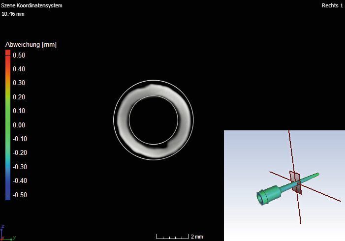 Schnittansicht (axial) der hirtisierten Düse mit CAD-Vergleich. Die CAD-Daten sind als weiße Linie dargestellt. (Visiconsult)